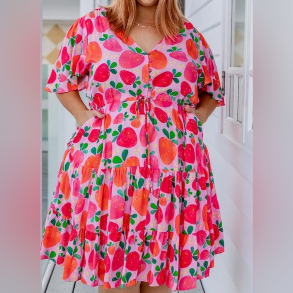 Proud Poppy strawberry print dress. Worn once. Love the style and fit.